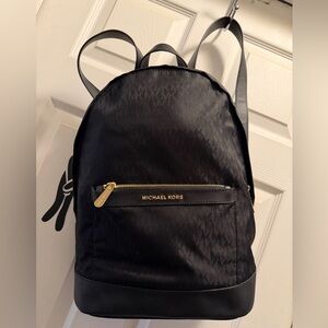 Michael Kors Jet Black Backpack with Gold Details